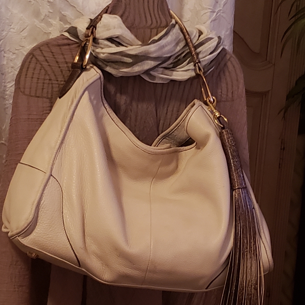 GILI  Pebble Leather Stirrup Satchel
